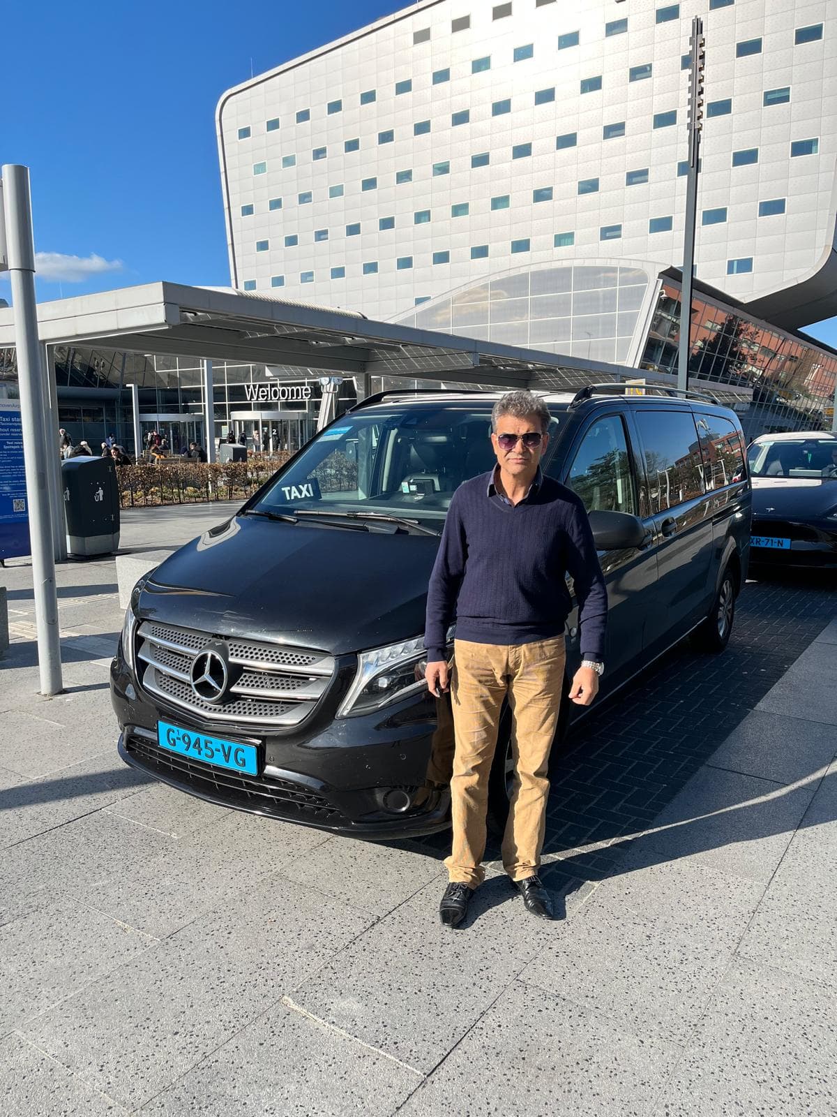 NilaTax driver at the airport